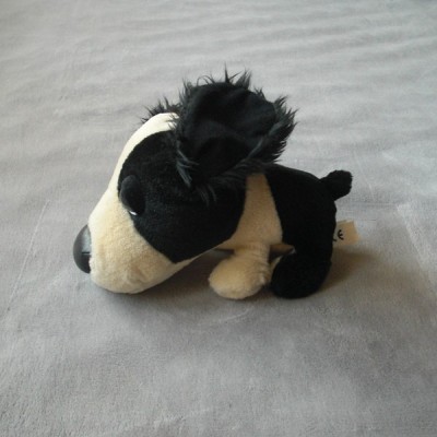 peluche chien noir et blanc