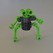 PLAYMOBIL Un robot gris et vert