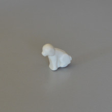 PLAYMOBIL Un petit chien assis blanc