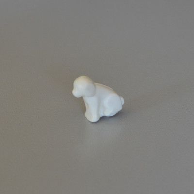 PLAYMOBIL Un petit chien assis blanc