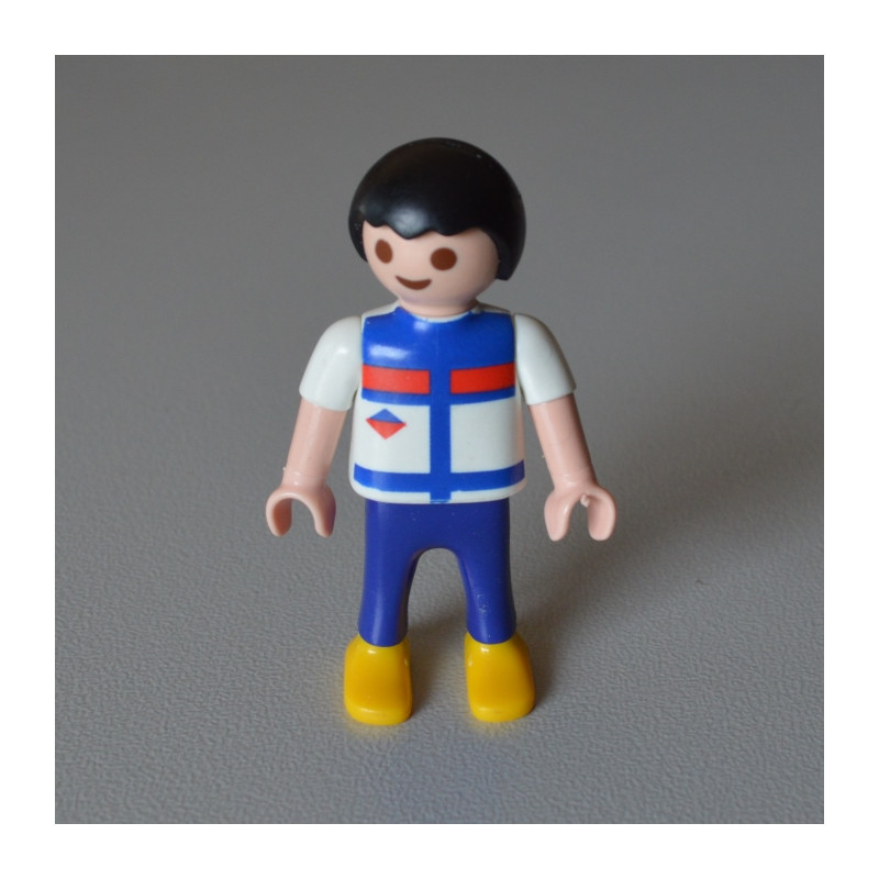 Un personnage : Garçon de couleur blanc et bleu marque PLAYMOBIL 1995.