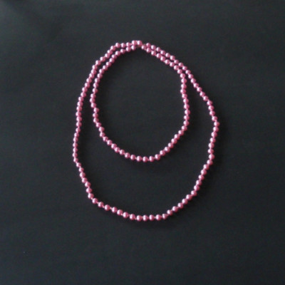 Collier de perles roses