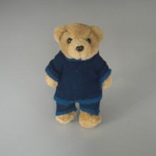 Peluche Ourson avec pantalon et pull over bleu Taille 20 cm