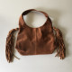 Sac a main en cuir marron avec pompons a franges